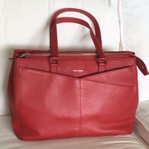 Cole Haan red tote travel bag.